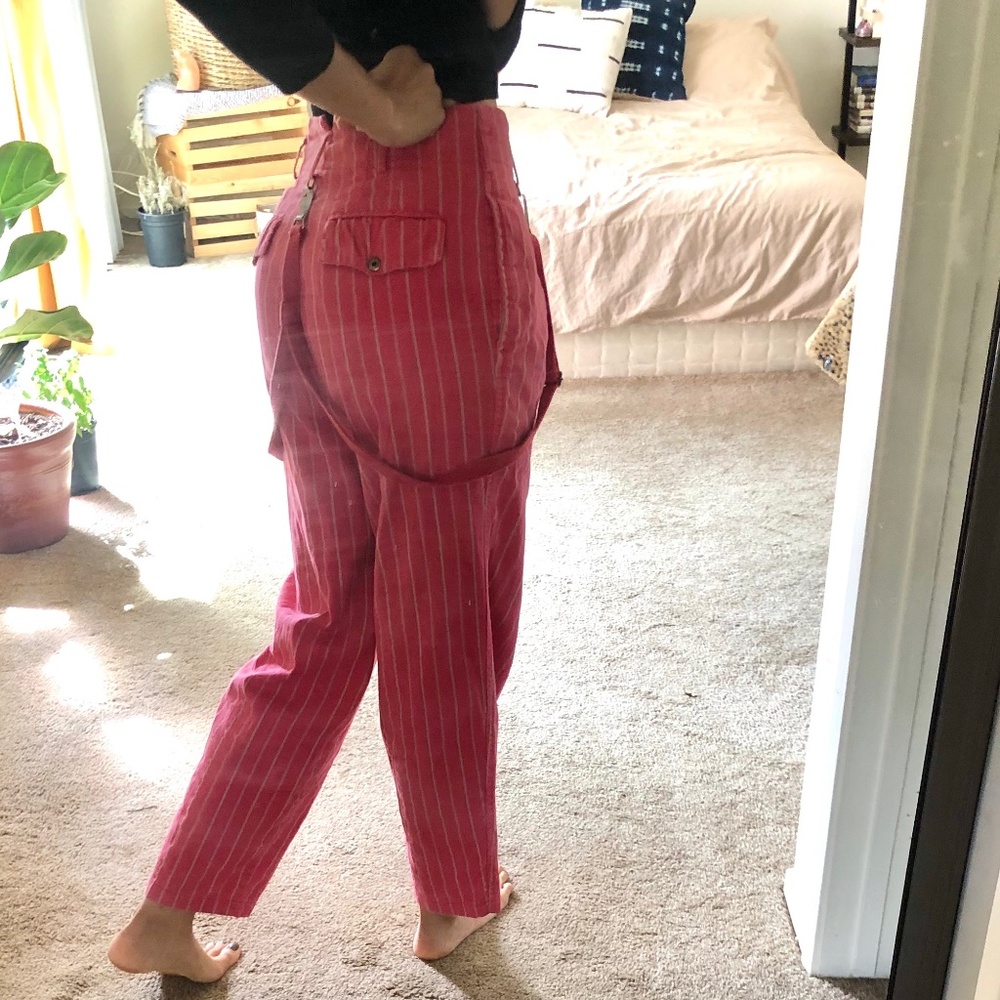 Pink high waisted trousers with pinstripes